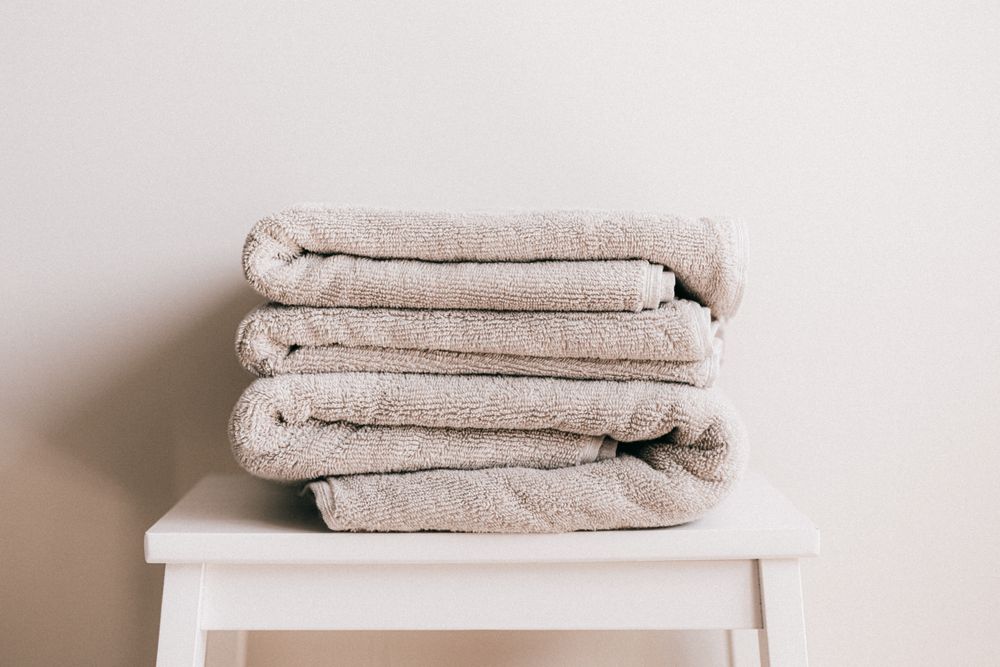 A stack of pressed, folded linen ready for delivery